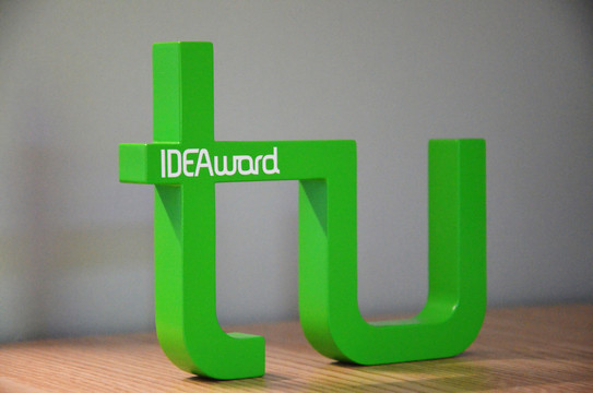 Lehrpreislogo IDEAward Foto zeigt das Logo des Lehrpreises: grüner Schriftzug der TU mit weißem Schriftzug IDEAward